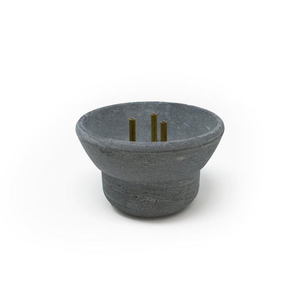 Large soapstone fountain on white background