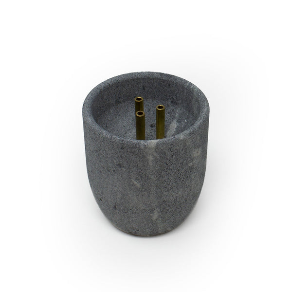 Soapstone sauna fountain on white background