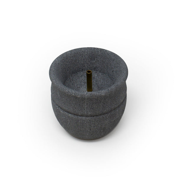 Soapstone sauna fountain on white background
