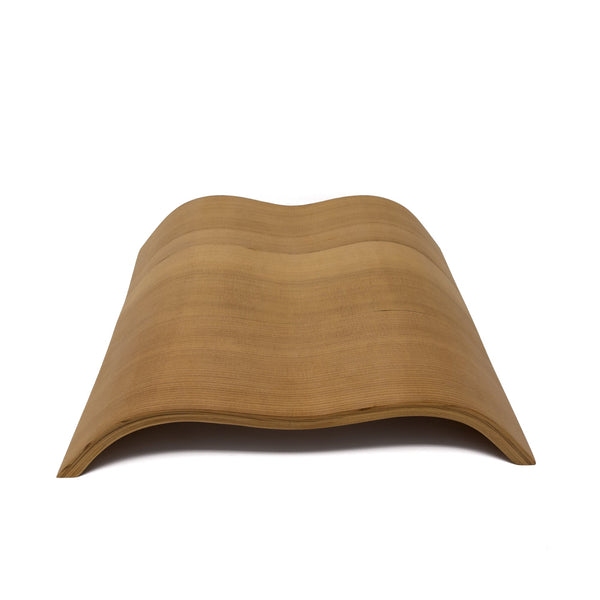 Curved cedar sauna headrest pillow on white background