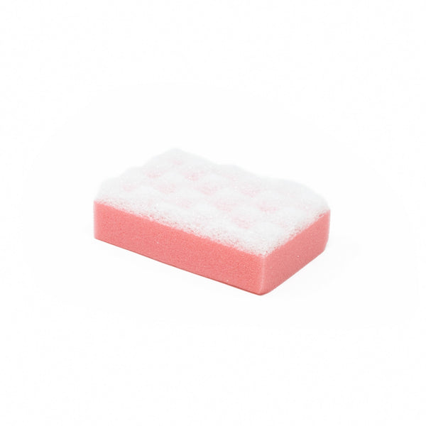 Unpackaged view of Red Exfoliating Shower Sponge on white background.