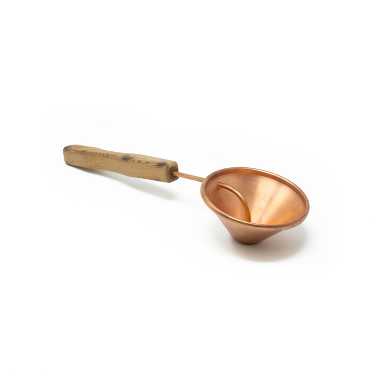 Handmade copper sauna scoop on white background