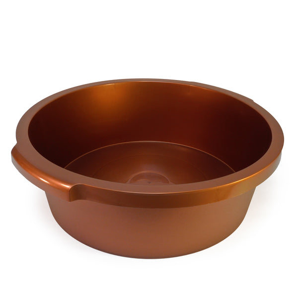 Copper colored plastic sauna basin on white background