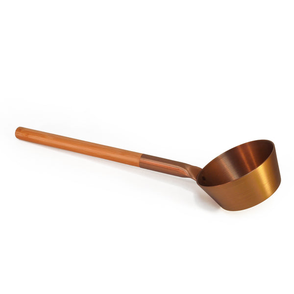 Brown brushed aluminum sauna scoop with wooden handle on white background