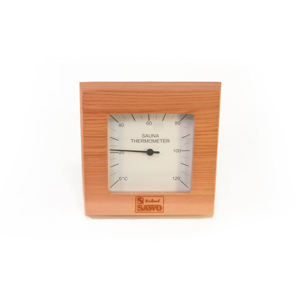 Cedar sauna thermometer with plastic dial cover on white background