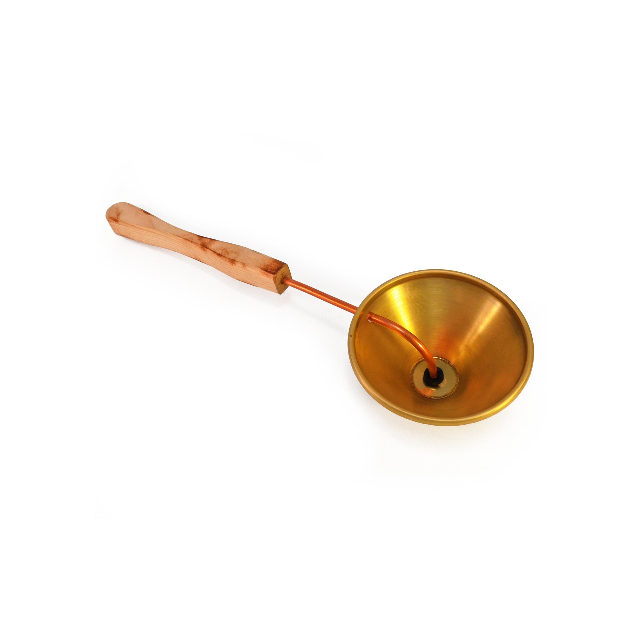 Wood, brass, and copper sauna scoop on white background.