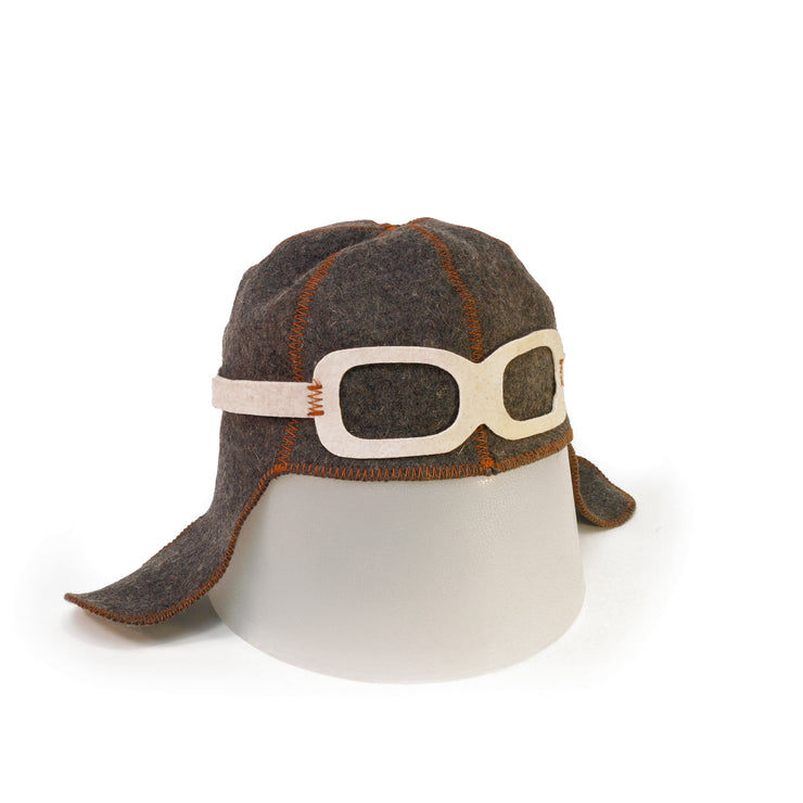Angle view of grey wool sauna hat in style of old time pilot on a white background.